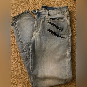 Rock & Republic jeans with zipper decals on front pocket, worn once